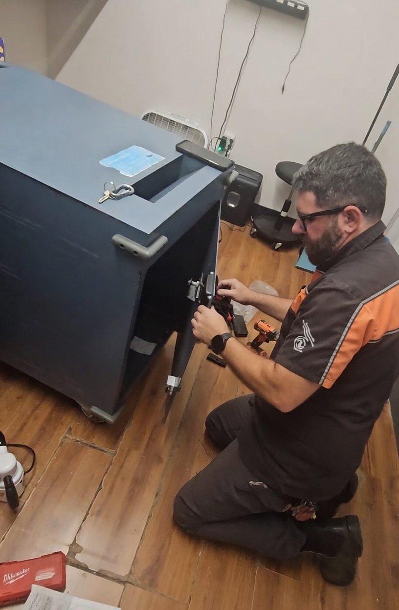 ReKey Xpress Locksmith specialist installing a high-security deadbolt on a residential home in The Woodlands.
