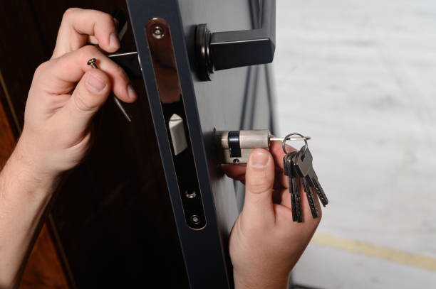 ReKey Xpress Locksmith technician unlocking residential door in Montgomery, TX<br />
